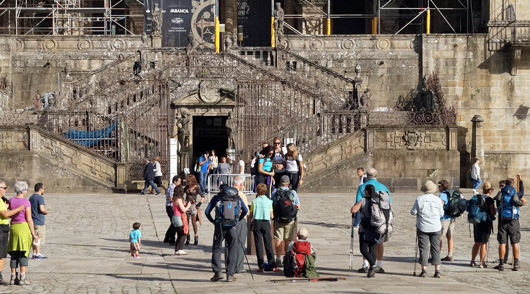 On Praza do Obradoiro, pilgrims was being pleased with each other in front of the cathedral
